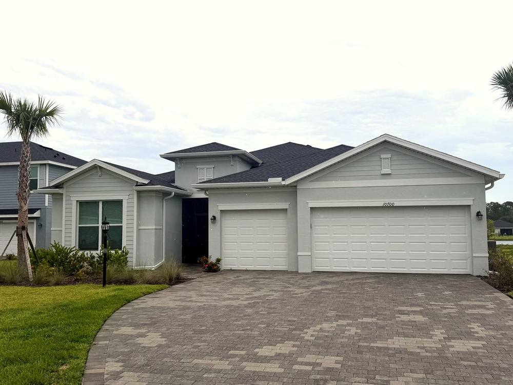 Same home with color-matched seamless gutters installed